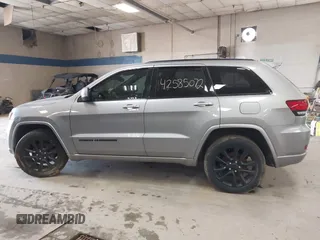 2018 Jeep Grand Cherokee Laredo E with VIN 1C4RJFAG7JC203793, listed as a IAAI auction lot 42585072 with 263,987 mi miles and . Bid and sale history available at DreamBid. Image 14.