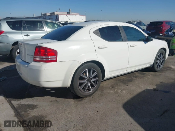 2010 Dodge Avenger SXT with VIN 1B3CC4FB6AN108889, listed as a IAAI auction lot 41049789 with 127,405 mi miles. Bid and sale history available at carsss.com. Image 4.