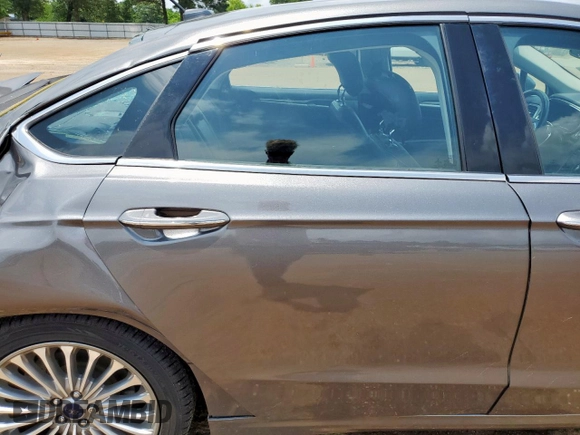2014 Ford Fusion Titanium Hybrid with VIN 3FA6P0RU2ER158302, listed as a Copart auction lot 59049995 with 108,571 mi miles and Salvage title. Bid and sale history available at DreamBid. Image 10.