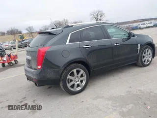 2012 Cadillac SRX Performance Collection with VIN 3GYFNEE32CS652976, listed as a IAAI auction lot 41427761 with 146,513 mi miles. Bid and sale history available at carsss.com. Image 4.