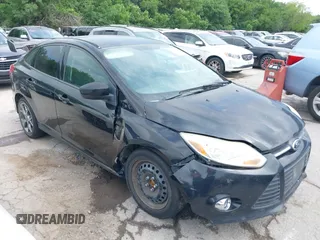 2012 Ford Focus SE with VIN 1FAHP3F28CL361932, listed as a IAAI auction lot 42142318 with 135,179 mi miles. Bid and sale history available at carsss.com. Image 1.