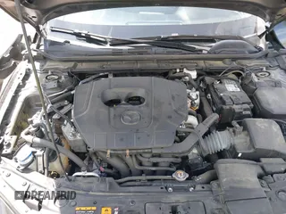 2023 Mazda 3 S Select with VIN JM1BPAKM3P1615785, listed as a IAAI auction lot 42064302 with 63,928 mi miles and . Bid and sale history available at DreamBid. Image 10.