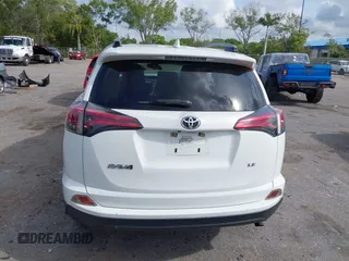 2017 Toyota RAV4 LE with VIN JTMZFREV3HJ143416, listed as a IAAI auction lot 41861981 with 115,241 mi miles and . Bid and sale history available at DreamBid. Image 16.