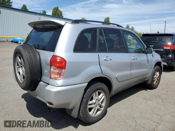 2003 Toyota RAV4 with VIN JTEGH20V936012689, listed as a Copart auction lot 61997965 with 214,693 mi miles and Clean title. Bid and sale history available at DreamBid. Image 3.