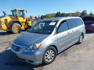 2009 Honda Odyssey EX-L with VIN 5FNRL38729B032786, listed as a IAAI auction lot 42012590 with 188,552 mi miles. Bid and sale history available at carsss.com. Image 2.