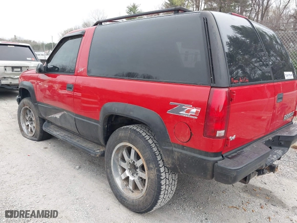 1996 Chevrolet Tahoe with VIN 3GNEK18R8TG153872, listed as a IAAI auction lot 41913476 with 120,686 mi miles. Bid and sale history available at carsss.com. Image 3.