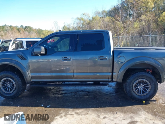 2020 Ford F-150 Raptor with VIN 1FTFW1RG7LFB08650, listed as a IAAI auction lot 40992485 with 102,115 mi miles and . Bid and sale history available at carsss.com. Image 14.
