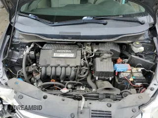 2011 Honda Insight EX with VIN JHMZE2H77BS006079, listed as a Copart auction lot 63873985 with 134,159 mi miles and Salvage title. Bid and sale history available at DreamBid. Image 11.