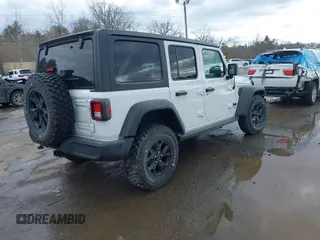 2022 Jeep Wrangler Unlimited Sport S with VIN 1C4HJXDG3NW155467, listed as a IAAI auction lot 41638650 with 22,698 mi miles and . Bid and sale history available at DreamBid. Image 4.