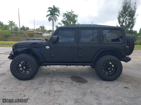 2018 Jeep Wrangler Unlimited Sport S with VIN 1C4HJXDG2JW228483, listed as a IAAI auction lot 41710364 with 56,970 mi miles. Bid and sale history available at carsss.com. Image 14.
