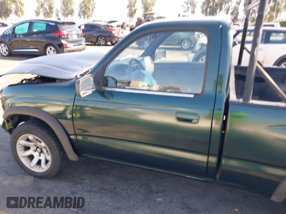 1999 Toyota Tacoma with VIN 4TANL42N7XZ481489, listed as a IAAI auction lot 40365153 with 218,971 mi miles. Bid and sale history available at carsss.com. Image 14.