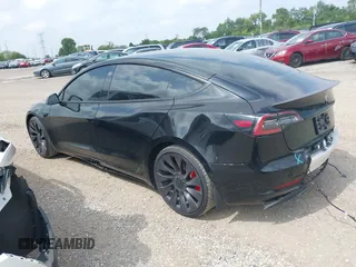 2021 Tesla Model 3 Performance with VIN 5YJ3E1EC5MF919278, listed as a IAAI auction lot 40194677 with 50,484 mi miles and . Bid and sale history available at carsss.com. Image 3.