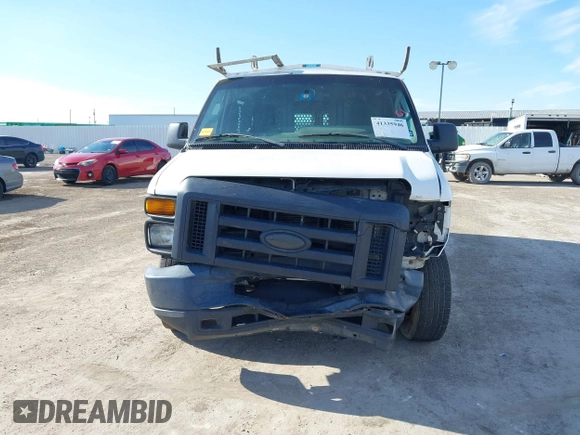2014 Ford Econoline Cargo Commercial with VIN 1FTNE1EW8EDB20428, listed as a IAAI auction lot 41335946 with 201,988 mi miles and . Bid and sale history available at DreamBid. Image 6.