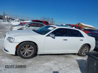 2016 Chrysler 300 with VIN 2C3CCAEG3GH225393, listed as a IAAI auction lot 41197790 with 129,453 mi miles. Bid and sale history available at carsss.com. Image 14.