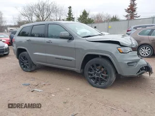 2021 Jeep Grand Cherokee Laredo X with VIN 1C4RJFAG3MC549120, listed as a IAAI auction lot 41887110 with 65,358 mi miles and . Bid and sale history available at DreamBid. Image 1.