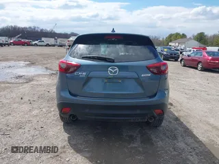2016 Mazda CX-5 Grand Touring with VIN JM3KE4DY0G0629924, listed as a IAAI auction lot 41878154 with 78,196 mi miles. Bid and sale history available at carsss.com. Image 16.