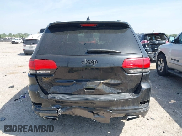 2015 Jeep Grand Cherokee Summit with VIN 1C4RJFJM1FC867861, listed as a IAAI auction lot 42034207 with 92,205 mi miles and . Bid and sale history available at DreamBid. Image 16.