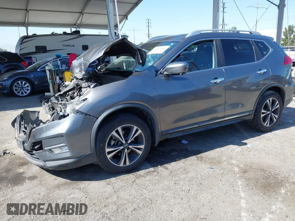 2017 Nissan Rogue S with VIN JN8AT2MV9HW263307, listed as a IAAI auction lot 42317181 with 114,445 mi miles and . Bid and sale history available at DreamBid. Image 17.