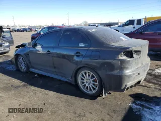 2010 Mitsubishi Lancer Evolution SE with VIN JA32W6FV8AU033981, listed as a Copart auction lot 87676155 with 150,901 mi miles and Salvage Title. Bid and sale history available at carsss.com. Image 2.