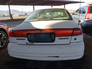 1998 Mercury Mystique z VIN 1MELM6539WK602026, wystawiony jako IAAI lot #41586256 z przebiegiem 134 707 mil mil oraz . Historia ofert i sprzedaży dostępna na DreamBid. Obrazek 16.