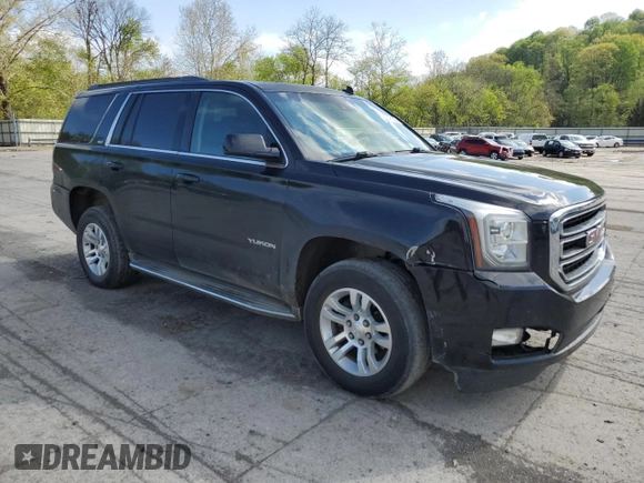 2015 GMC Yukon SLT with VIN 1GKS2BKC6FR145140, listed as a Copart auction lot 55451365 with 216,522 mi miles and Salvage Title. Bid and sale history available at DreamBid. Image 4.