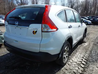 2014 Honda CR-V LX with VIN 5J6RM4H30EL114694, listed as a IAAI auction lot 41123860 with 153,896 mi miles. Bid and sale history available at carsss.com. Image 4.