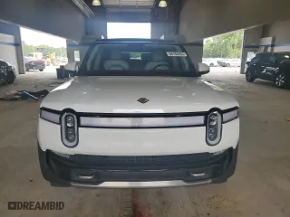 2023 Rivian R1S Adventure with VIN 7PDSGABAXPN021962, listed as a Copart auction lot 66184454 with 0 mi miles and Salvage Title. Bid and sale history available at carsss.com. Image 5.