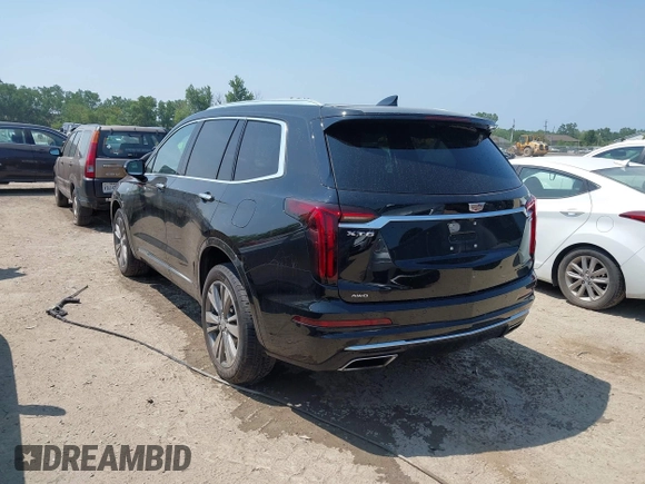 2021 Cadillac XT6 Premium Luxury with VIN 1GYKPDRS0MZ153523, listed as a IAAI auction lot 42770895 with 19,843 mi miles and . Bid and sale history available at DreamBid. Image 3.