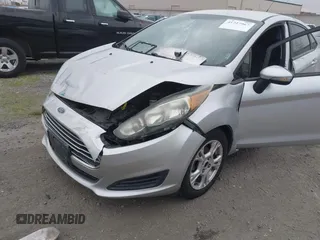2016 Ford Fiesta SE with VIN 3FADP4BJ0GM121019, listed as a IAAI auction lot 41727967 with 87,725 mi miles and . Bid and sale history available at DreamBid. Image 12.