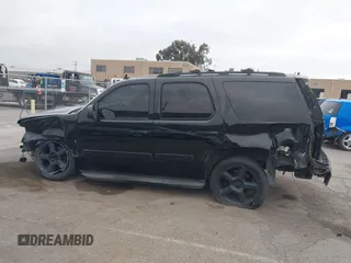 2013 Chevrolet Tahoe LT with VIN 1GNSKBE05DR152825, listed as a IAAI auction lot 41450863 with 157,305 mi miles and . Bid and sale history available at DreamBid. Image 15.