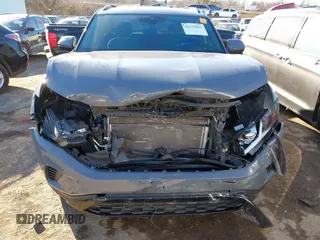 2021 Volkswagen Atlas SEL Premium with VIN 1V2TE2CAXMC215550, listed as a IAAI auction lot 41579665 with 55,264 mi miles and . Bid and sale history available at DreamBid. Image 6.