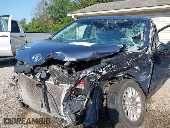2014 Toyota Sienna XLE with VIN 5TDYK3DCXES524294, listed as a IAAI auction lot 42546467 with 122,257 mi miles and . Bid and sale history available at DreamBid. Image 6.