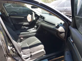 2019 Honda Civic LX with VIN 19XFC2F64KE041024, listed as a IAAI auction lot 42020159 with 36,870 mi miles and . Bid and sale history available at DreamBid. Image 5.