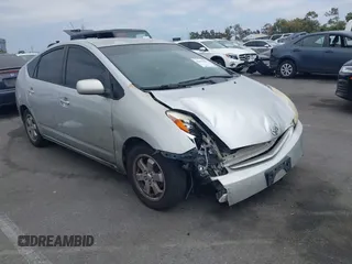 2005 Toyota Prius z VIN JTDKB20U557046391, wystawiony jako IAAI lot #42452591 z przebiegiem 258 011 mil mil oraz . Historia ofert i sprzedaży dostępna na DreamBid. Obrazek 1.