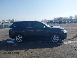 2014 Mitsubishi Outlander GT with VIN JA4JZ4AX8EZ016070, listed as a IAAI auction lot 41771934 with 157,724 mi miles and . Bid and sale history available at DreamBid. Image 13.