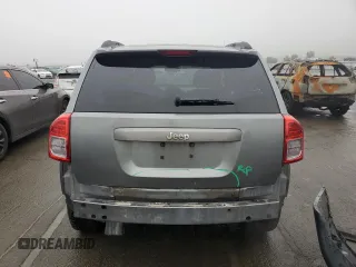 2011 Jeep Compass Latitude with VIN 1J4NT1FB6BD248643, listed as a Copart auction lot 86403584 with 179,795 mi miles and Salvage Title. Bid and sale history available at carsss.com. Image 6.