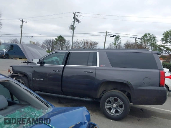 2017 Chevrolet Suburban LT z VIN 1GNSKHKC2HR315082, wystawiony jako IAAI lot #41545420 z przebiegiem 117 565 mil mil oraz . Historia ofert i sprzedaży dostępna na DreamBid. Obrazek 14.