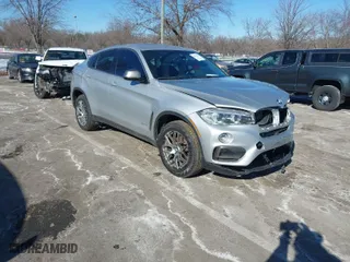 2018 BMW X6 xDrive35i with VIN 5UXKU2C50J0X51275, listed as a IAAI auction lot 41421704 with 165,052 mi miles. Bid and sale history available at carsss.com. Image 1.