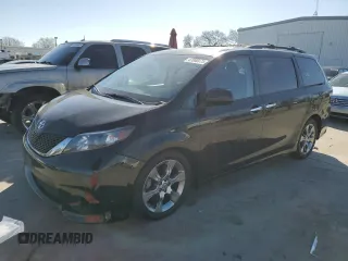 2014 Toyota Sienna SE with VIN 5TDXK3DC2ES482229, listed as a Copart auction lot 47080475 with 316,711 mi miles and Salvage Title. Bid and sale history available at DreamBid. Image 1.