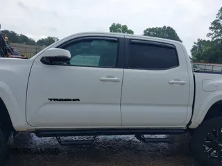 2019 Toyota Tacoma SR z VIN 3TMCZ5AN0KM232852, wystawiony jako IAAI lot #42178269 z przebiegiem 71 545 mil mil oraz . Historia ofert i sprzedaży dostępna na DreamBid. Obrazek 14.