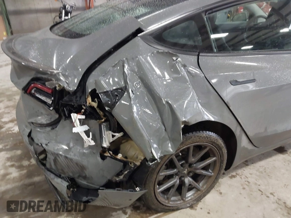 2018 Tesla Model 3 Long Range Battery with VIN 5YJ3E1EB8JF113566, listed as a IAAI auction lot 41726484 with 91,255 mi miles and . Bid and sale history available at DreamBid. Image 6.
