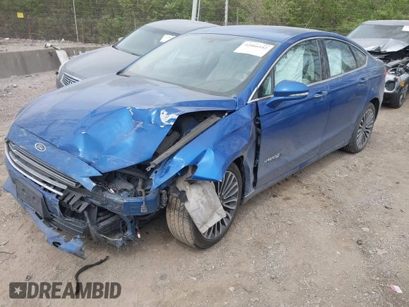 2017 Ford Fusion Hybrid Titanium с VIN 3FA6P0RU5HR388615, выставлен на аукционе IAAI как лот 42066142 с пробегом 121 618 миль миль и . История ставок и продаж доступна на DreamBid. Изображение 17.