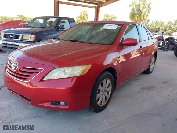 2007 Toyota Camry CE with VIN JTNBE46K873115041, listed as a IAAI auction lot 42023383 with 184,372 mi miles. Bid and sale history available at carsss.com. Image 2.