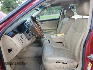 2006 Cadillac DTS 1SC z VIN 1G6KD57Y86U199826, wystawiony jako Copart lot #71582074 z przebiegiem 170 583 mil mil oraz Szkoda całkowita • Salvage title. Historia ofert i sprzedaży dostępna na DreamBid. Obrazek 7.