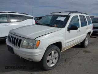 2001 Jeep Grand Cherokee Limited with VIN 1J4GW58N21C560302, listed as a IAAI auction lot 41072475 with 172,529 mi miles. Bid and sale history available at carsss.com. Image 2.