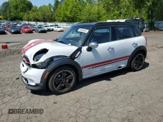 2015 MINI Countryman John Cooper Works with VIN WMWXD1C58FWS34860, listed as a Copart auction lot 55384065 with 48,709 mi miles and Salvage Title. Bid and sale history available at DreamBid. Image 1.