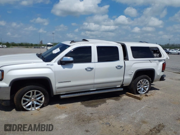 2018 GMC Sierra 1500 SLT z VIN 3GTU2NEC9JG240754, wystawiony jako IAAI lot #41890229 z przebiegiem 183 966 mil mil oraz . Historia ofert i sprzedaży dostępna na DreamBid. Obrazek 14.