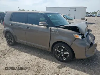 2012 Scion xB z VIN JTLZE4FE3CJ016375, wystawiony jako Copart lot #56891175 z przebiegiem 150 731 mil mil oraz Szkody całkowita. Historia ofert i sprzedaży dostępna na DreamBid. Obrazek 4.