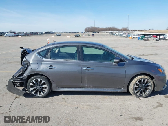2019 Nissan Sentra S z VIN 3N1AB7AP2KY382191, wystawiony jako IAAI lot #41780173 z przebiegiem 138 588 mil mil oraz . Historia ofert i sprzedaży dostępna na DreamBid. Obrazek 13.