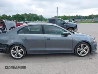 2017 Volkswagen Jetta GLI with VIN 3VW5T7AJ7HM318507, listed as a IAAI auction lot 42538952 with 143,130 mi miles and . Bid and sale history available at DreamBid. Image 14.